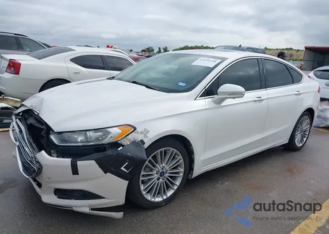 2014 Ford Fusion Hybrid Se z USA, uszkodzony, nr VIN 3FA6P0LUXER226838